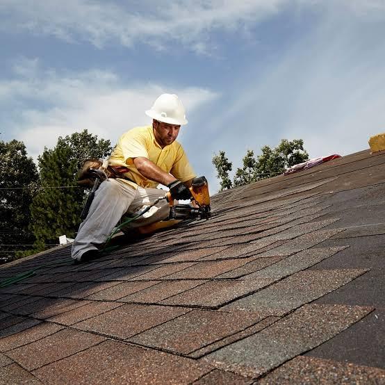 Roofer at work